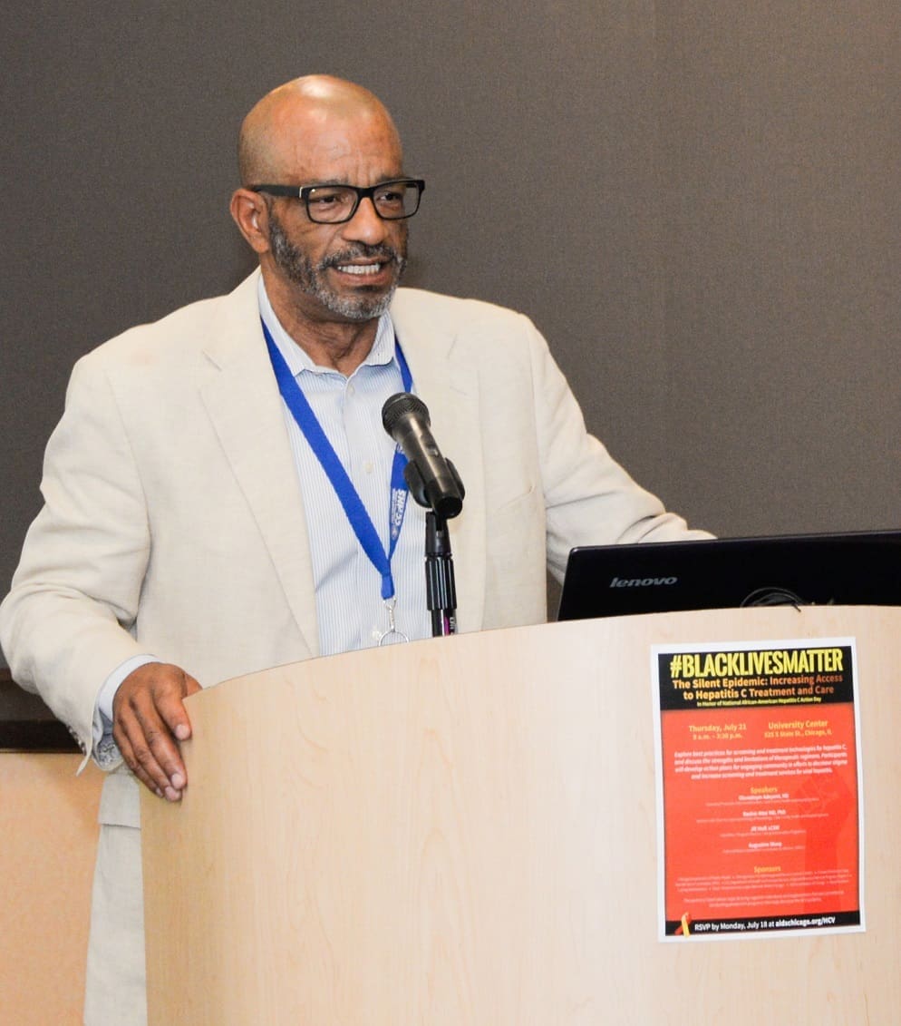 McLoyd speaking at a conference